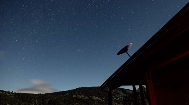 A Starlink satellite dish mounted on a roof.