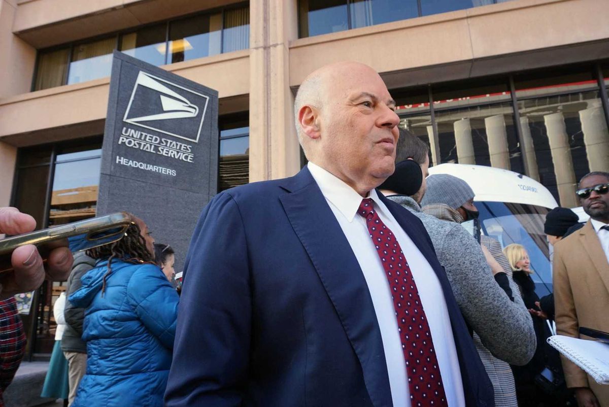 Postmaster General Louis DeJoy outside the USPS headquarters in Washington, DC.