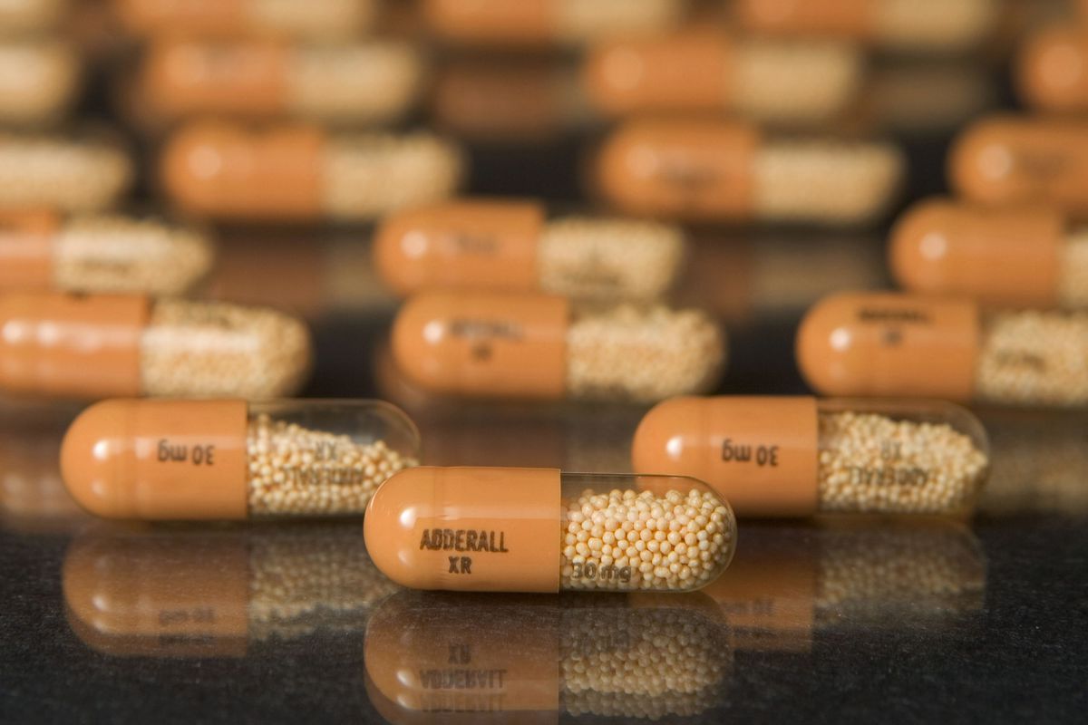 Adderall XR tablets on a table.